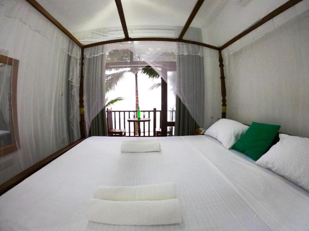 Asa Bay Beach Resort Талпе Екстериор снимка